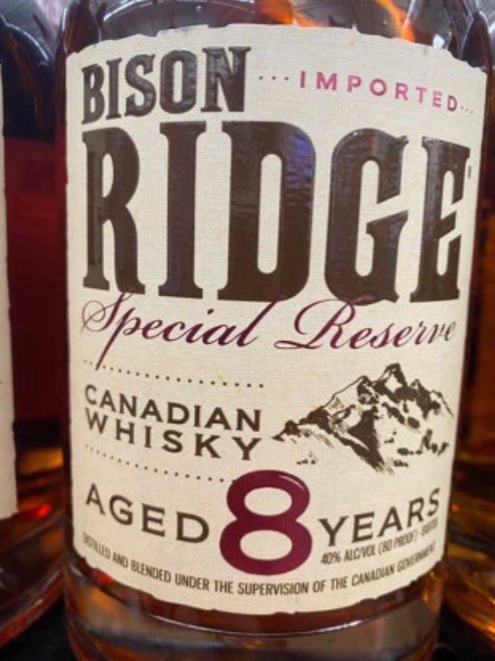 A bottle of bison ridge special reserve canadian whisky aged 8 years