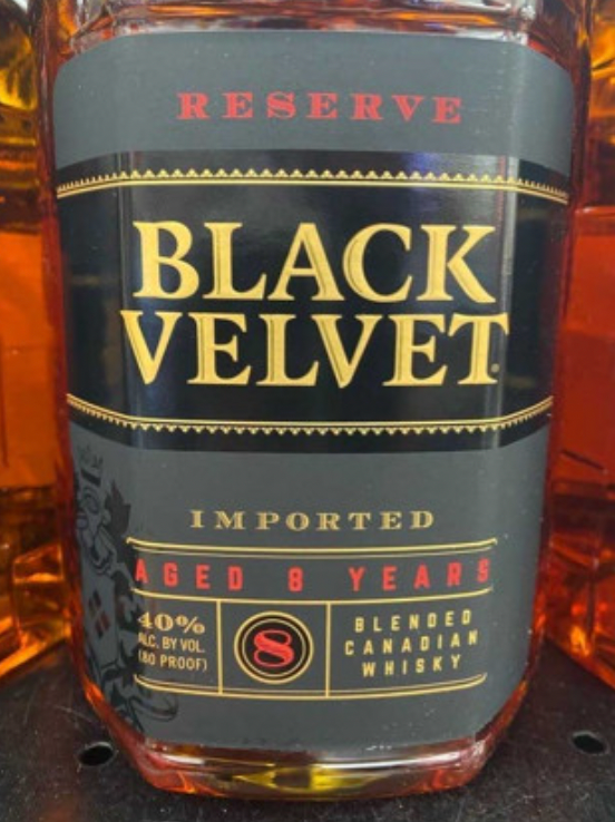 A bottle of black velvet reserve imported whiskey