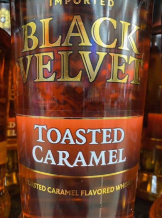 A bottle of black velvet toasted caramel flavored whiskey
