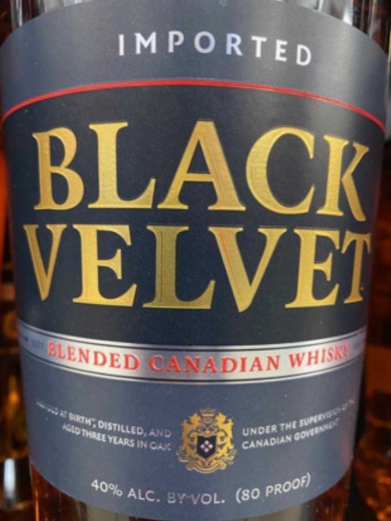 A bottle of imported black velvet blended canadian whiskey