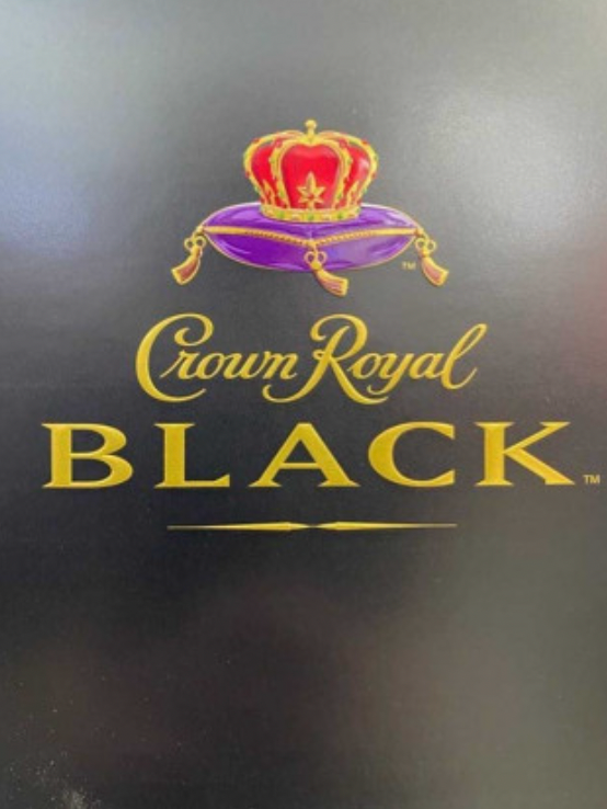 A crown royal black logo on a black background