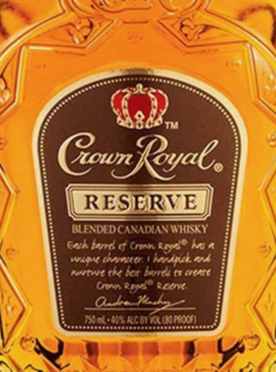 A bottle of crown royal reserve blended canadian whisky