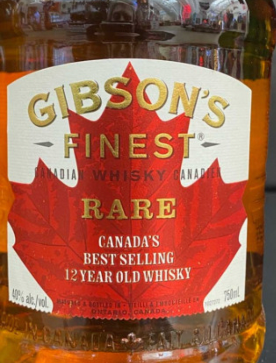 A bottle of gibson 's finest rare canada 's best selling 12 year old whisky