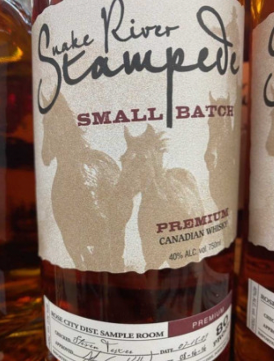 A bottle of snake river stampede small batch premium canadian whiskey