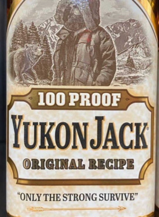 A bottle of yukon jack 100 proof original recipe