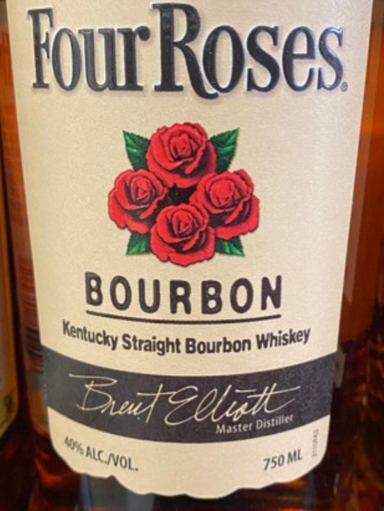 A bottle of four roses kentucky straight bourbon whiskey