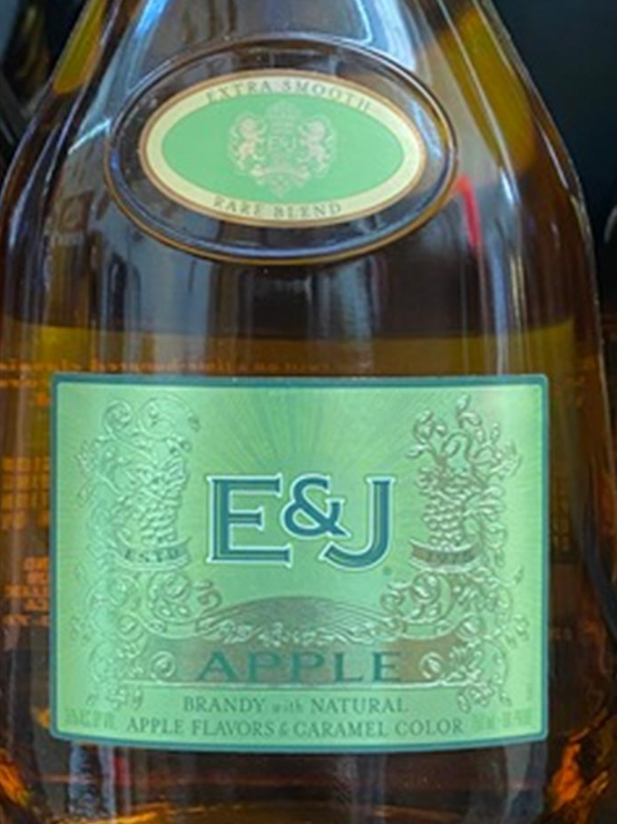 A close up of a bottle of e & j apple brandy