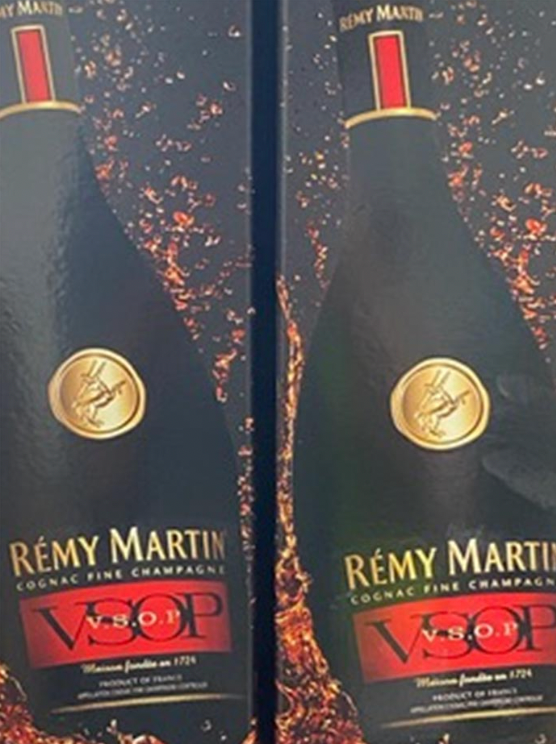 Two boxes of remy martin v.o.p. champagne