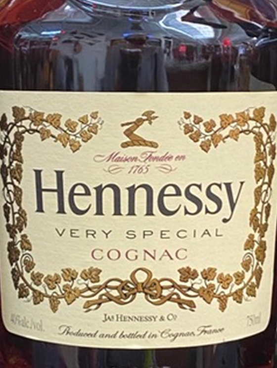 A close up of a bottle of hennessy very special cognac