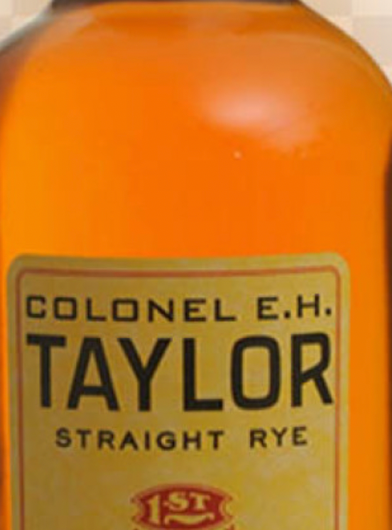 A bottle of colonel e.h. taylor straight rye