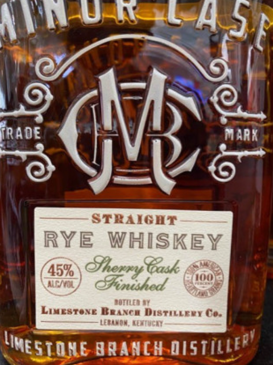 A bottle of limestone branch distillery straight rye whiskey