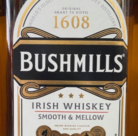 A bottle of bushmills irish whiskey smooth and mellow
