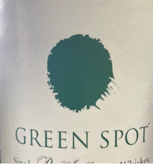 A green spot logo on a white background