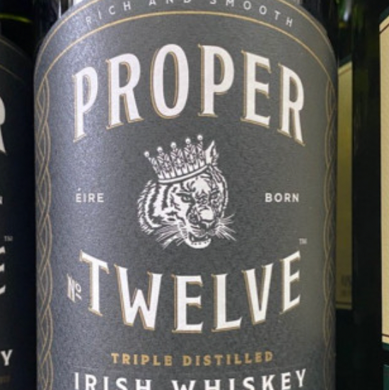 A bottle of proper twelve triple distilled irish whiskey