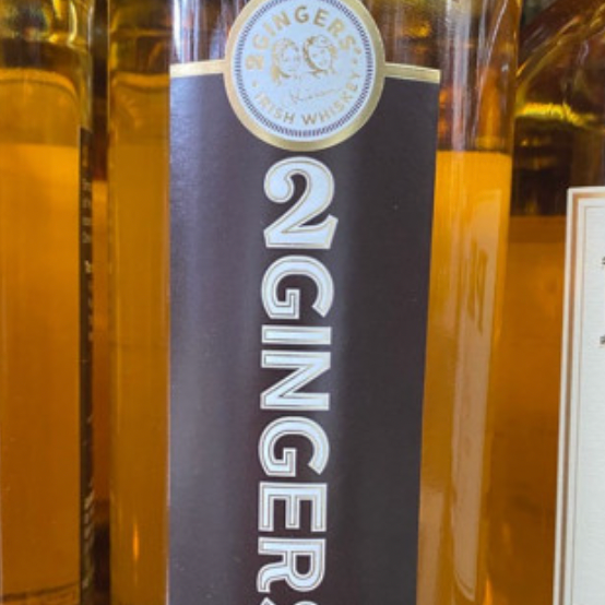 A close up of a bottle of ginger ale