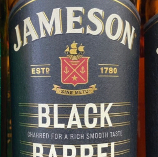 A close up of a bottle of jameson black barrel