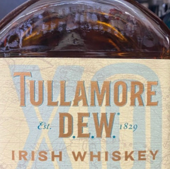 A close up of a bottle of tullamore dew irish whiskey