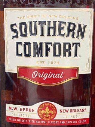 A close up of a bottle of southern comfort original