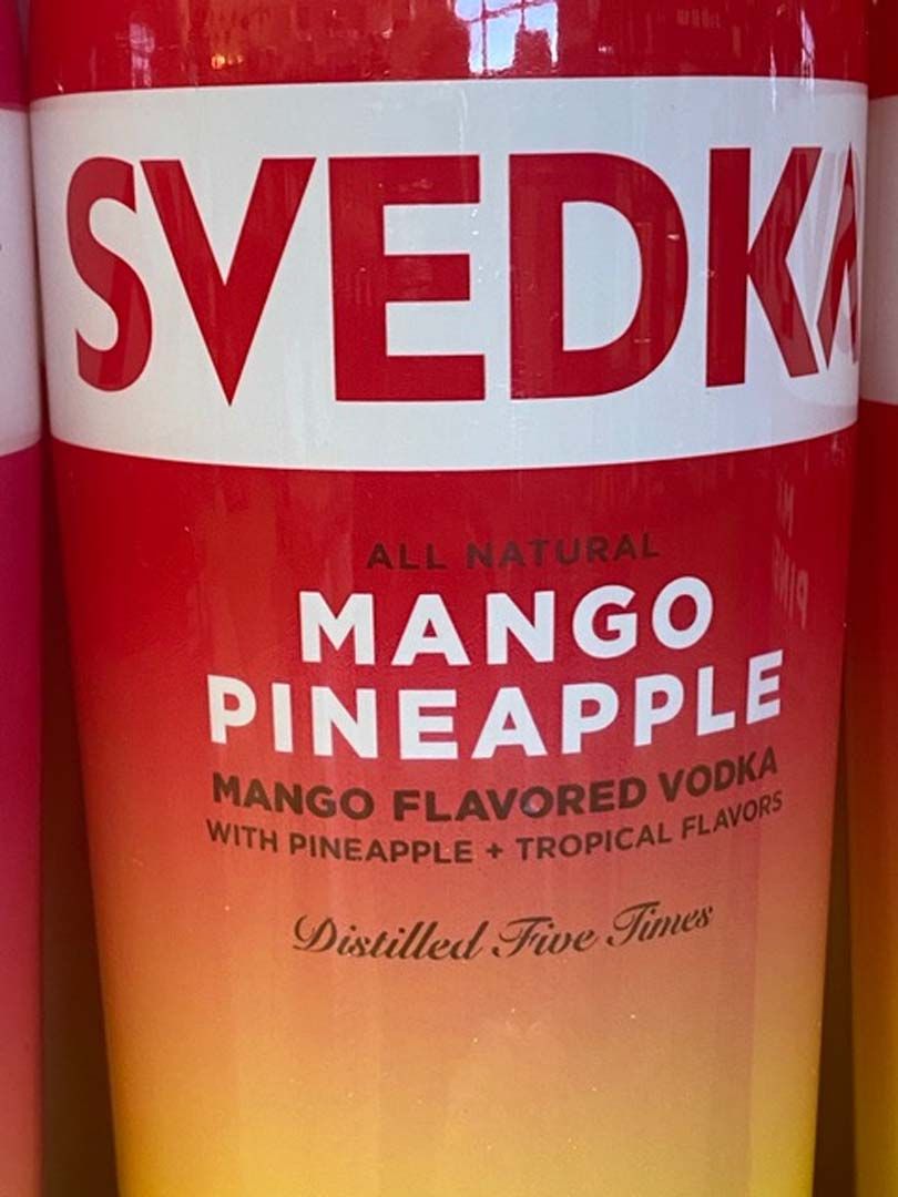 A can of svedk mango pineapple vodka with pineapple and tropical flavors