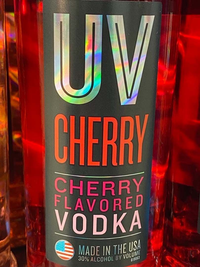 A bottle of uv cherry flavored vodka made in the usa
