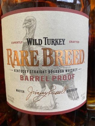 A bottle of wild turkey rare breed kentucky straight bourbon whiskey barrel proof