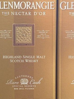 A close up of a box of lenmorangie glen highland single malt scotch whisky.