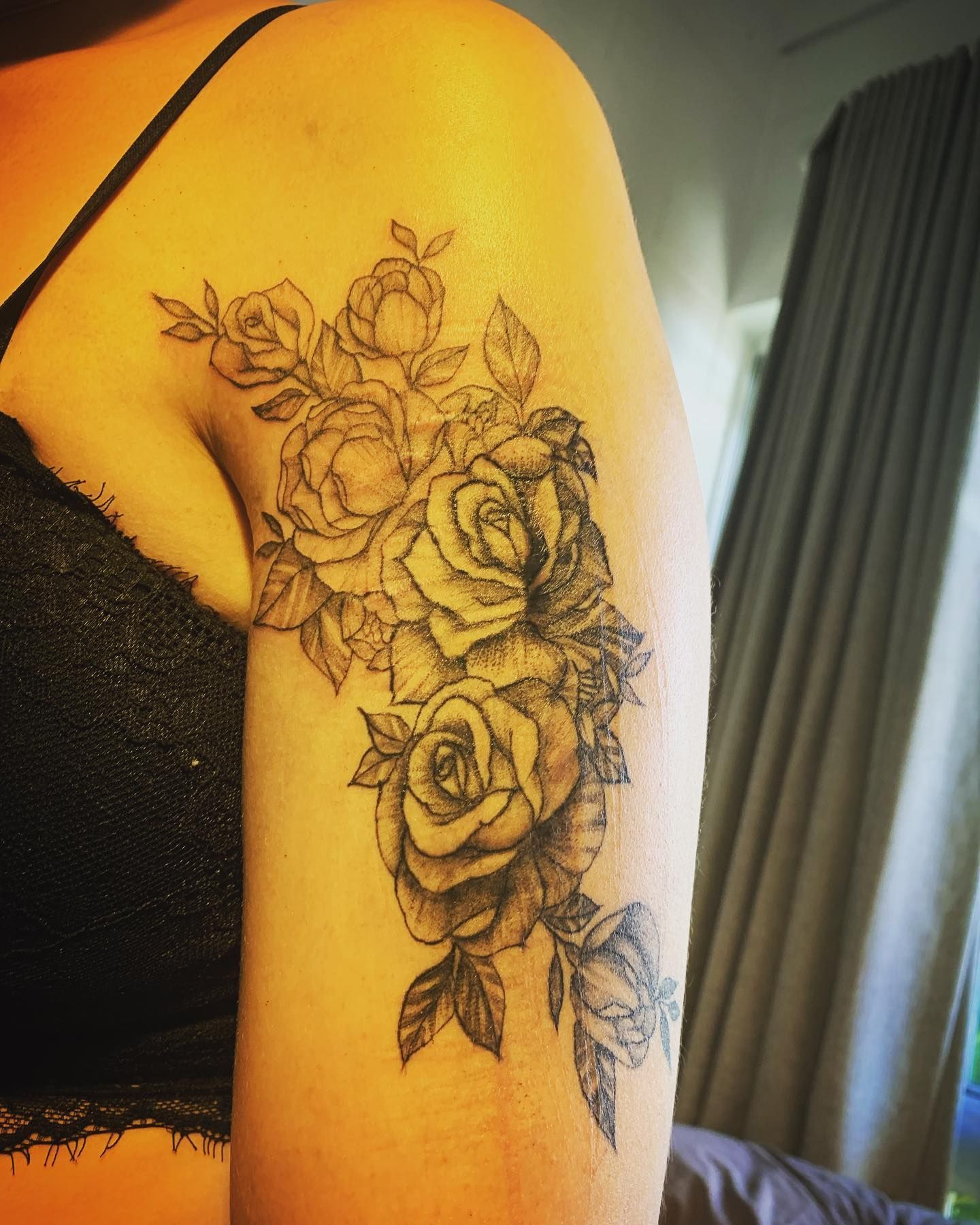 Tattoo of A Floral Bouquet on A Person's Upper Arm — Thaiger Ink In Holloways Beach, QLD