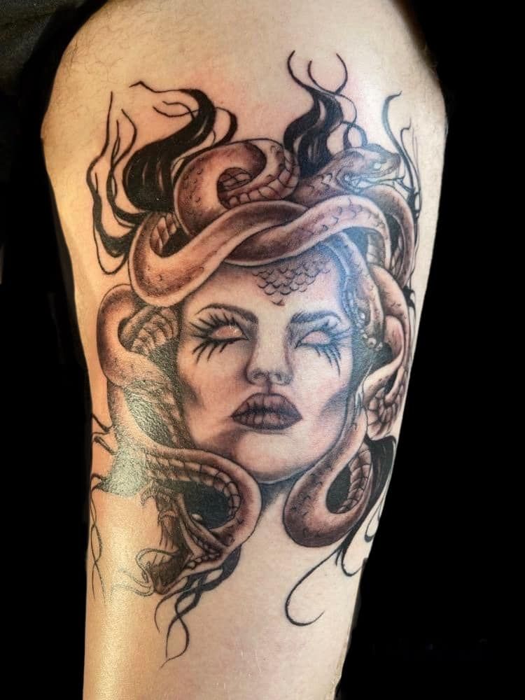 A Woman Has a Medusa Tattoo on Her Arm — Thaiger Ink in Holloways Beach, QLD
