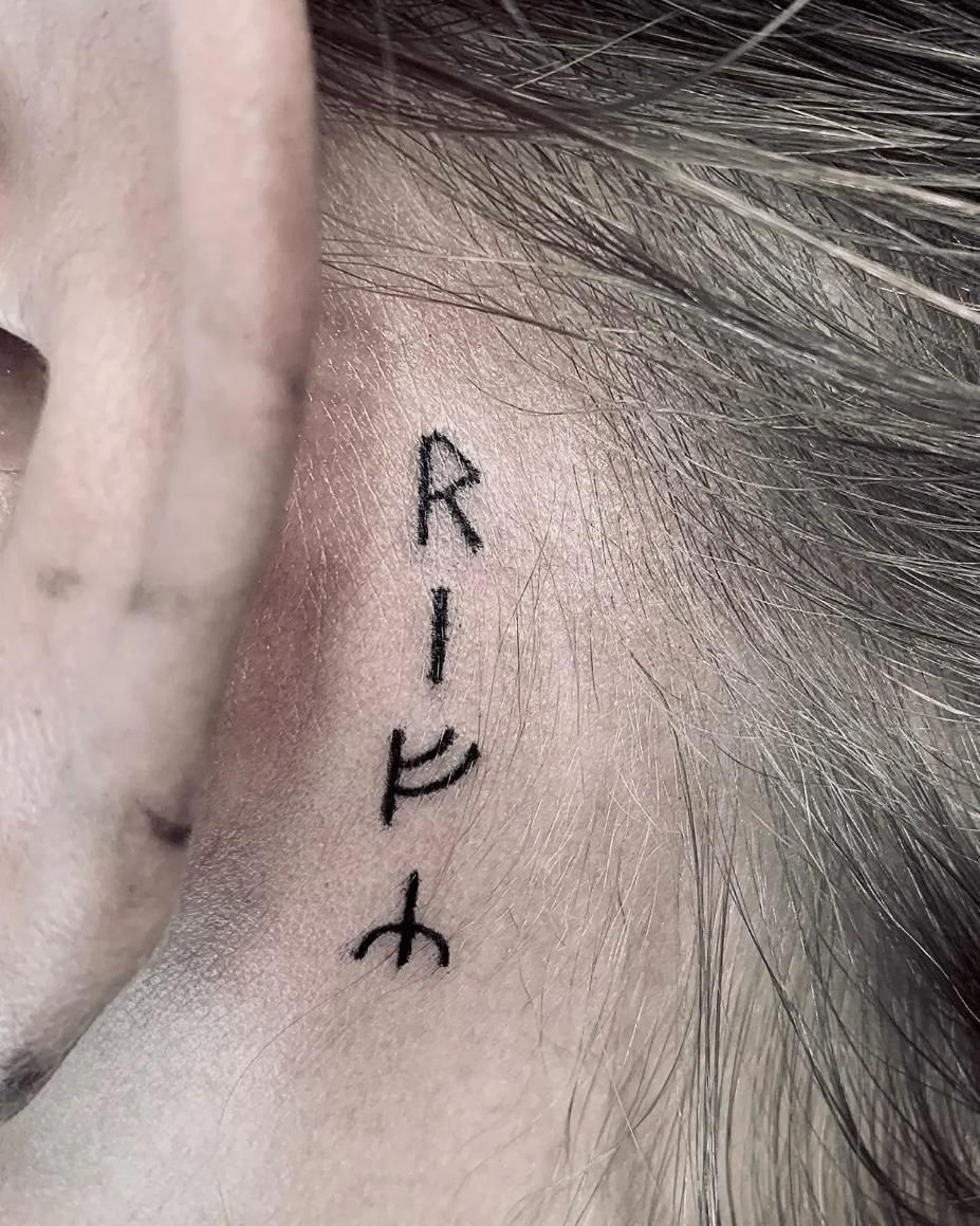 A Close up Of a Person 's Ear with A Tattoo on It  — Thaiger Ink in Holloways Beach, QLD