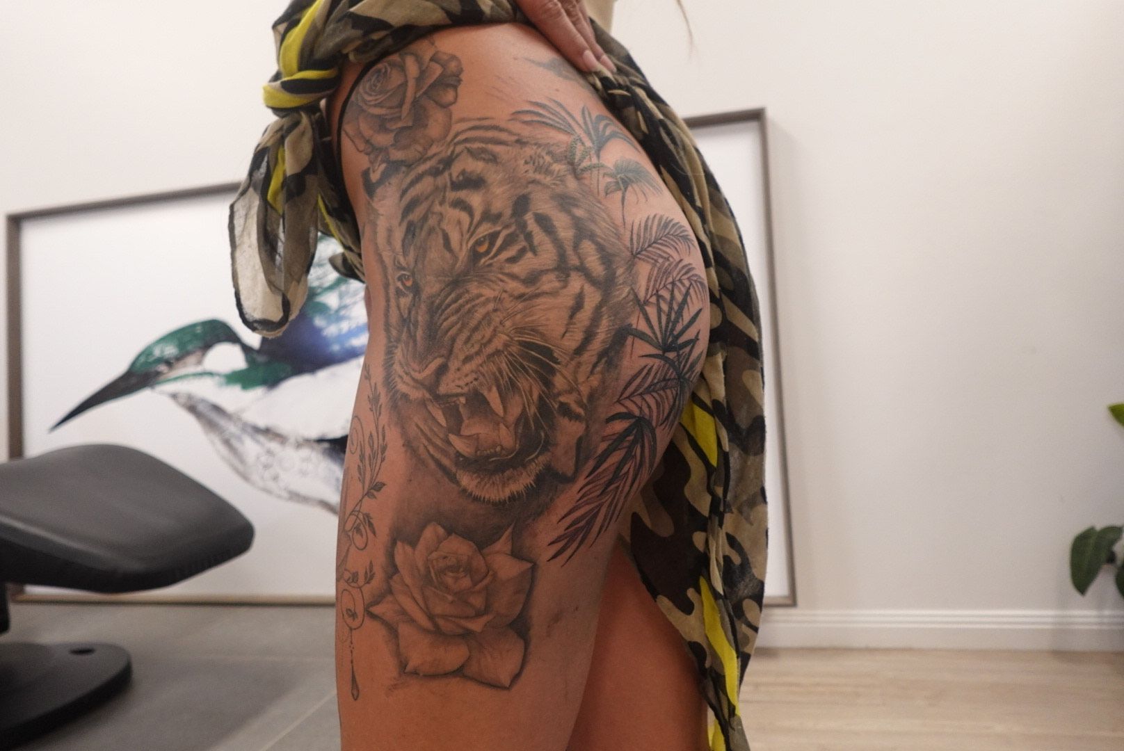 Tattoo of A Tiger with Roses on A Person's Thigh — Thaiger Ink In Holloways Beach, QLD