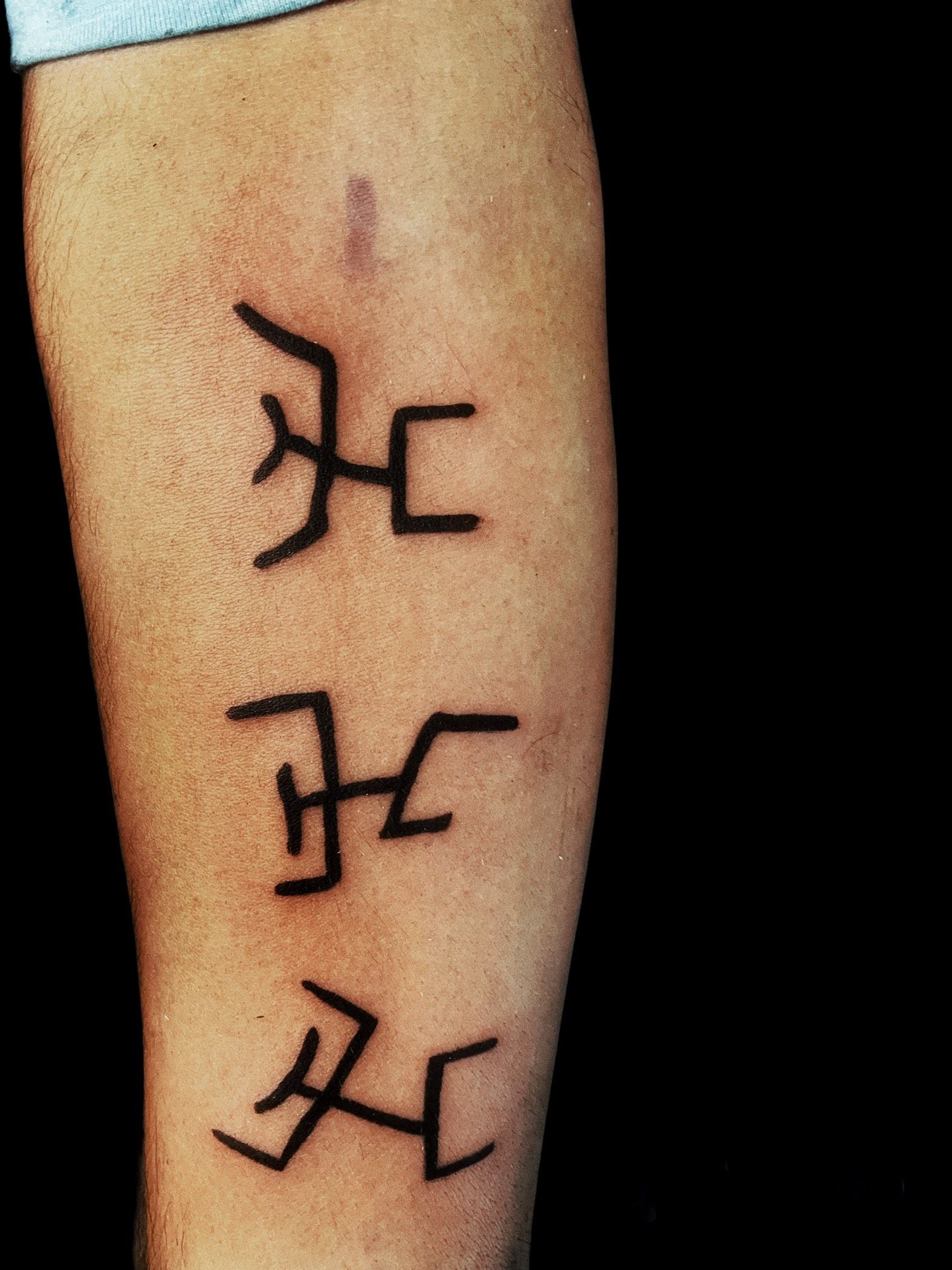 Three Black Geometric Tattoos on Light Skin — Thaiger Ink In Holloways Beach, QLD