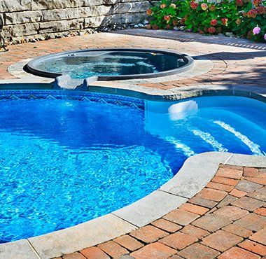 Swimming Pool with Hot Tub — Flowery Branch, GA — Living Waters Pools & Hardscapes