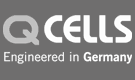 Das Q-Cells-Logo ist grau und weiß und wurde in Deutschland entworfen.