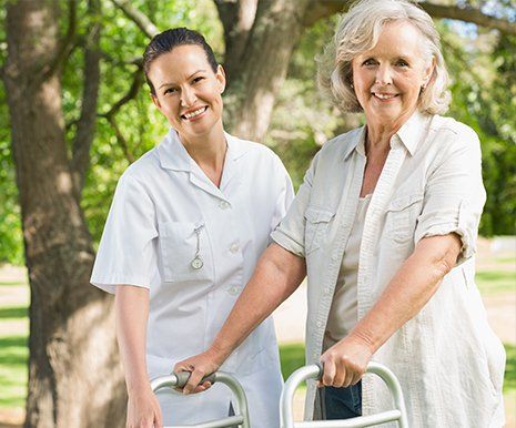 Caregiver and Patient in the Park — Columbus, OH — Caring Heart Home Health Agency