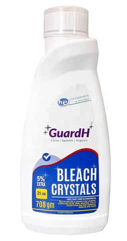 A bottle of guard bleach crystals on a white background.