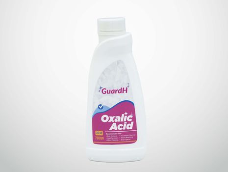 A bottle of oxalic acid on a white background.