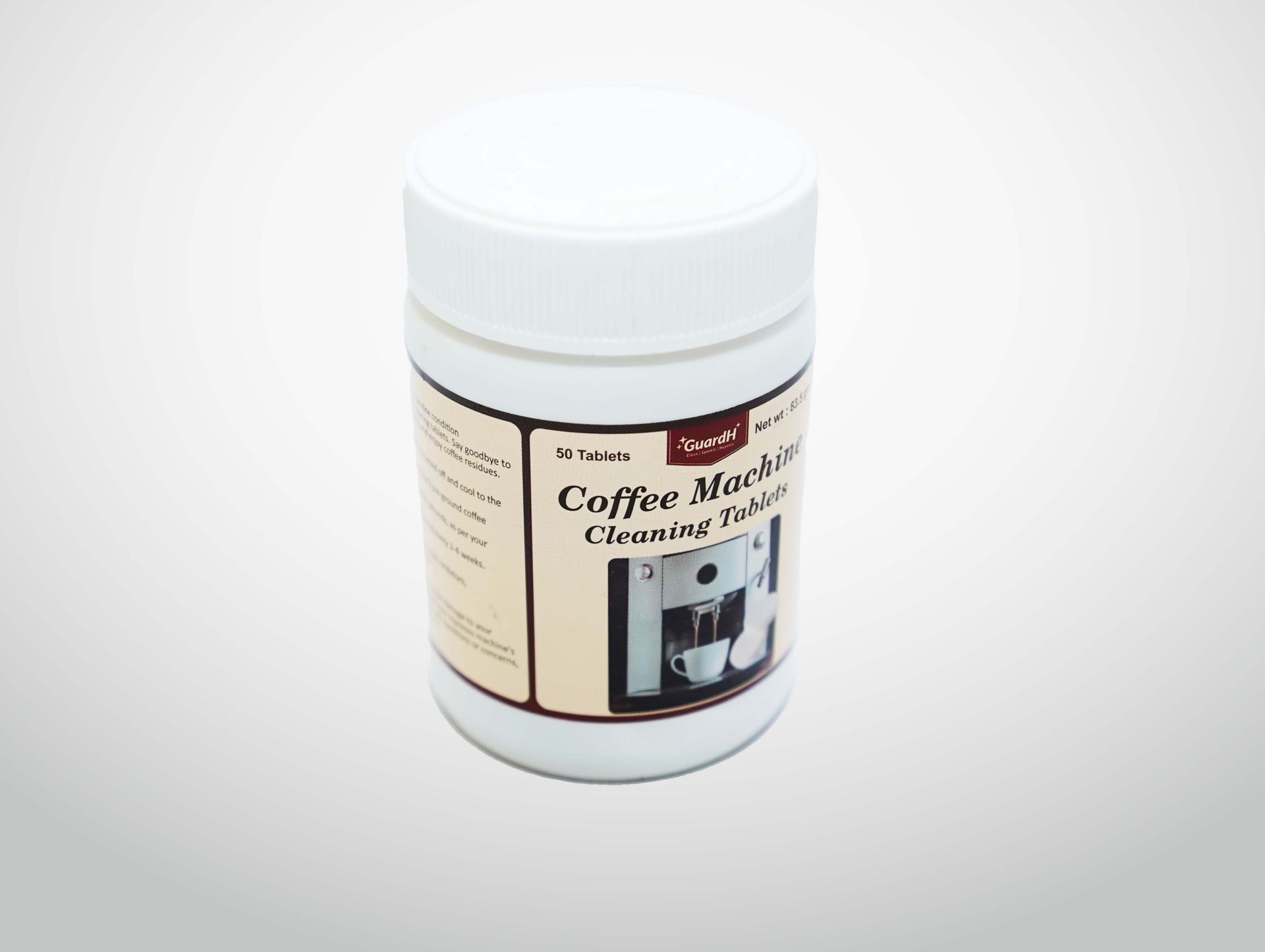 A white jar of coffee machine cleaner powder