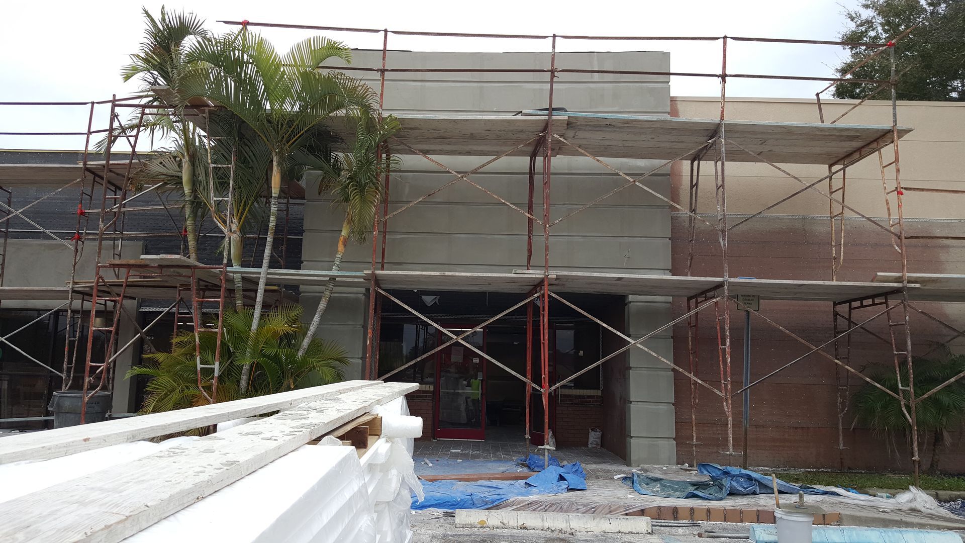 A building under construction with scaffolding around it