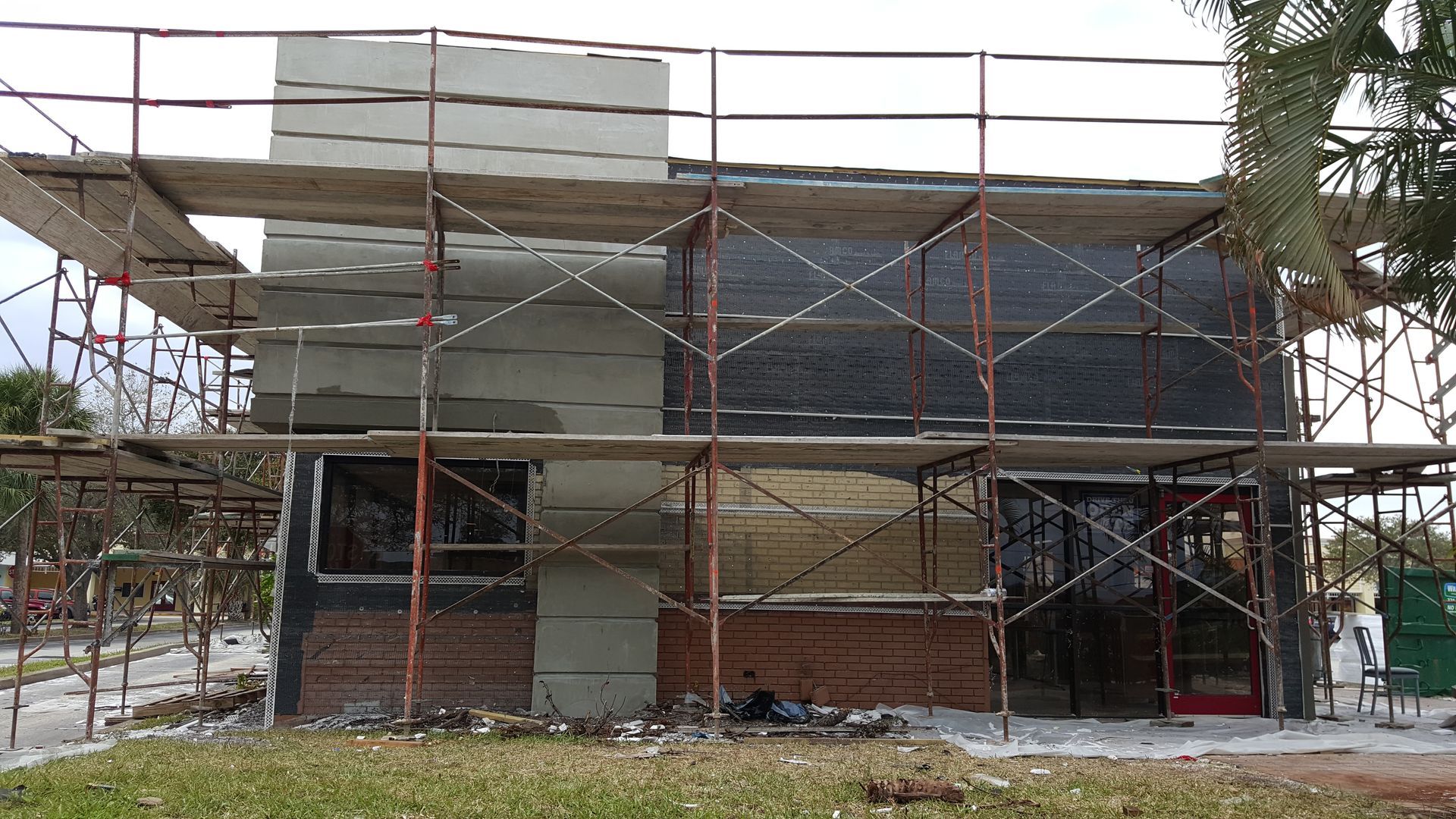 A building under construction with scaffolding around it