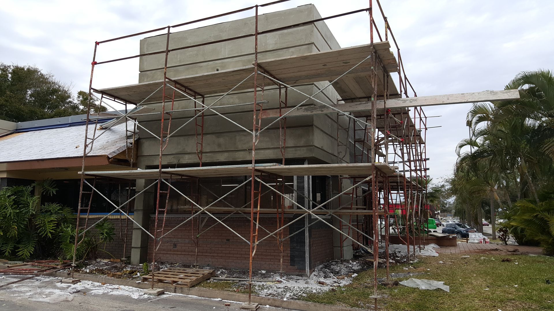 A building under construction with scaffolding around it