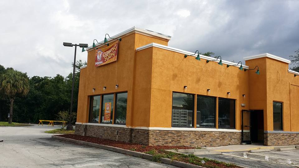 commercial building with concrete and bricks design