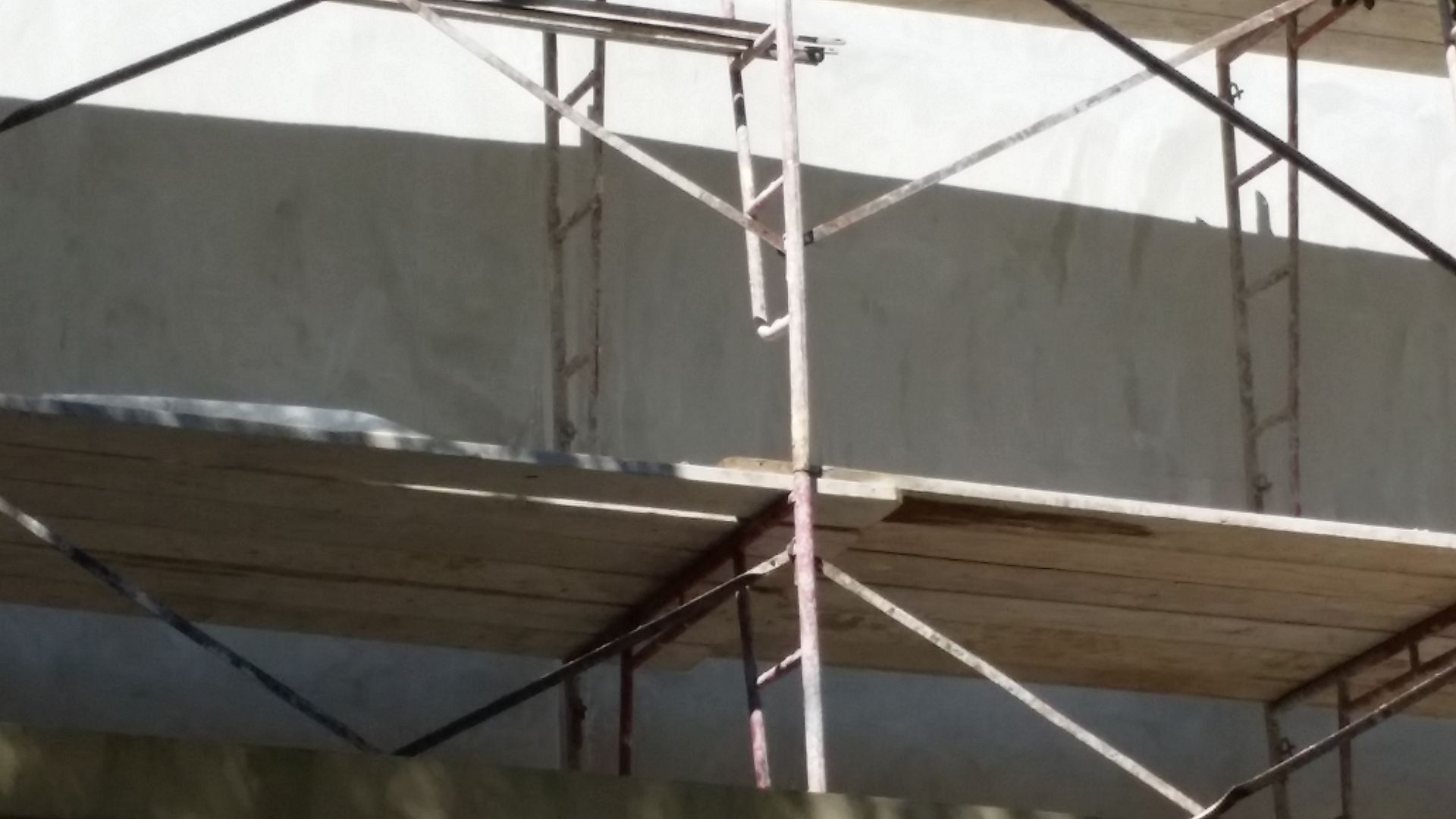 A scaffolding is being used to build a building
