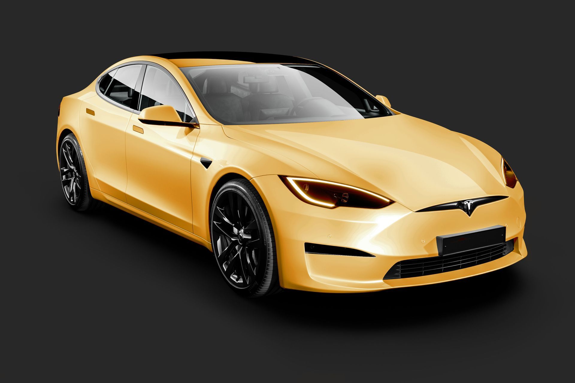 a yellow tesla model s is on a black background .