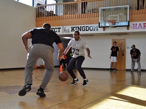 A basketball court with a sign that says kingdom on it