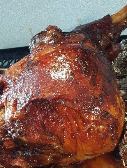 A close up of a roasted turkey on a plate