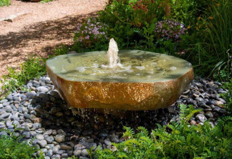 15 Unique and Amazing Lawn Displays -  Stone Fountain