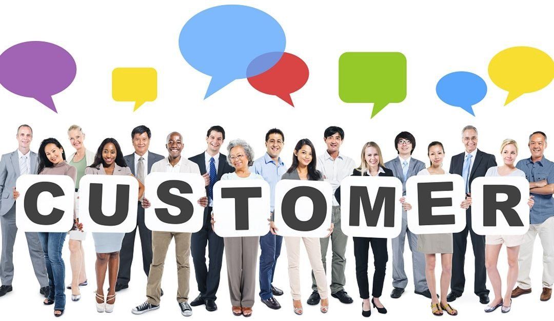 People Holding Each Letter of the Word Customer