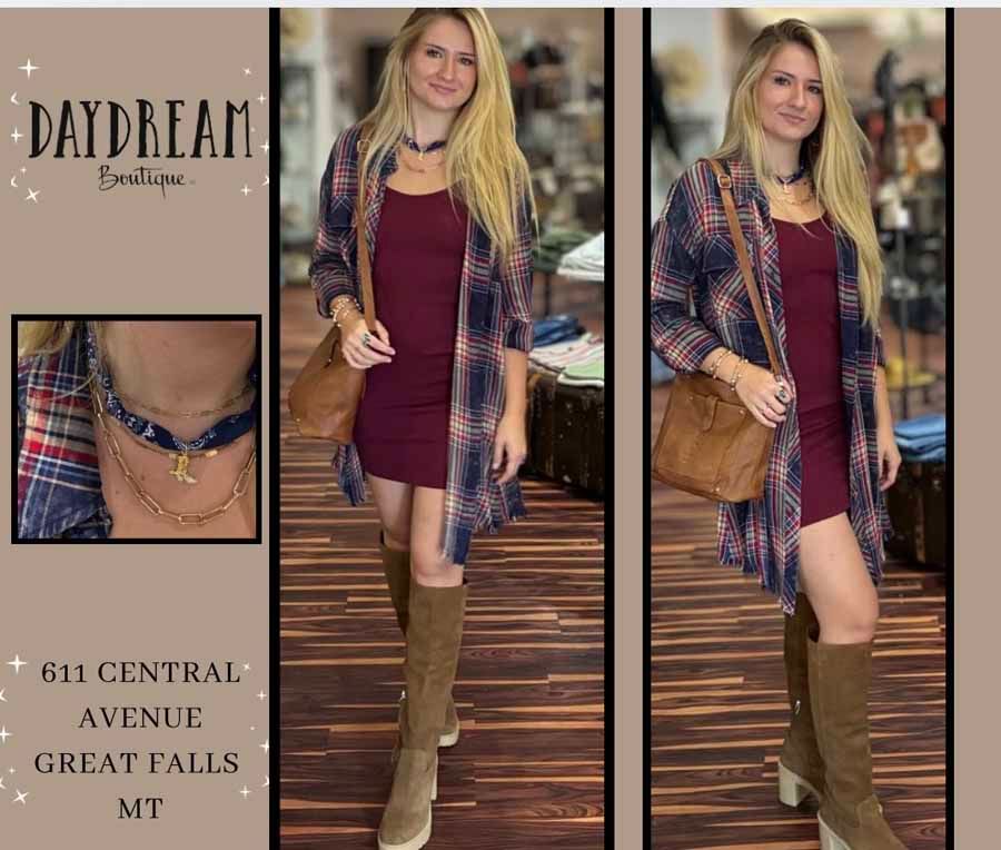 Woman in maroon dress, plaid cardigan, and boots. Daydream Boutique, Great Falls, MT.