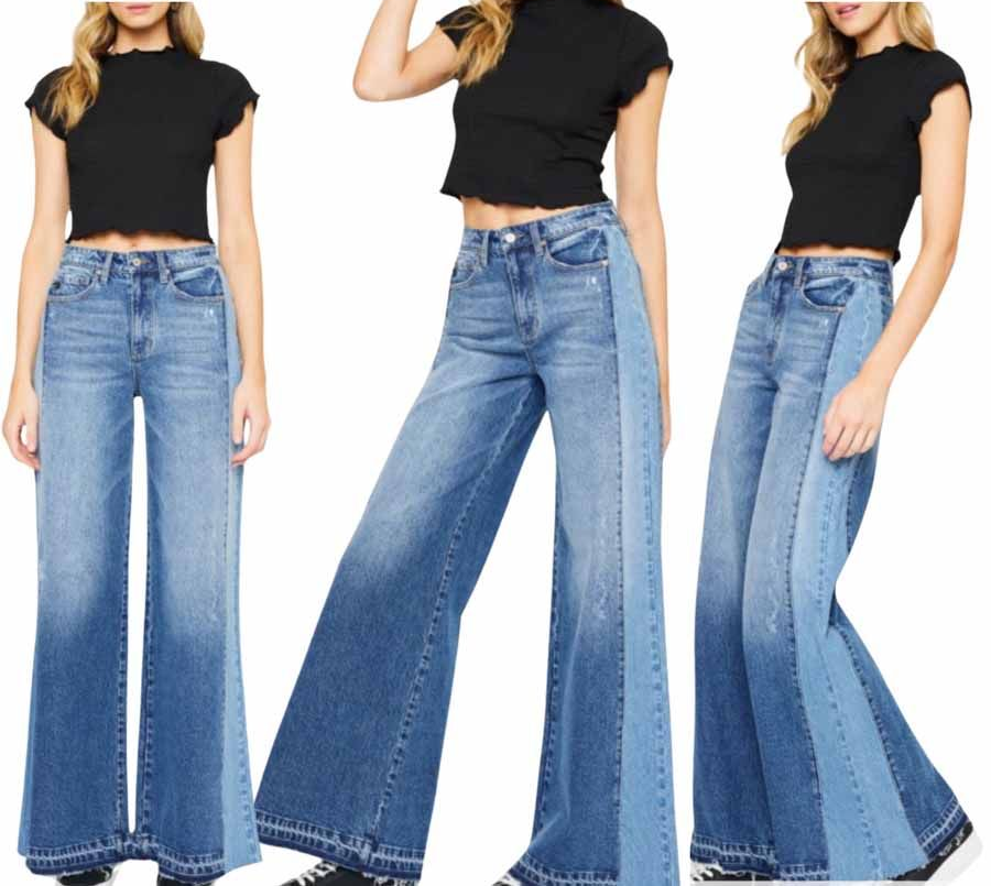 Three women in black tops and two-tone wide-leg jeans.