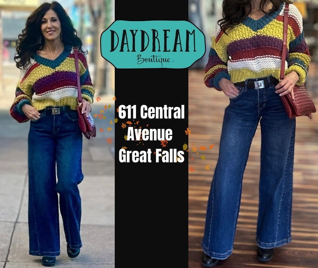 Two women in a store advertisement, one on the left and right, wearing colorful sweaters and wide-leg jeans.